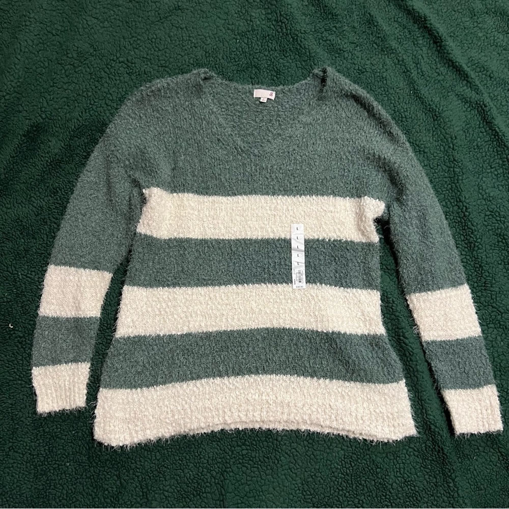 Green and white sweater